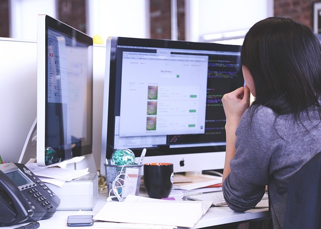 A nurse student sits in an office to plan for academic success.